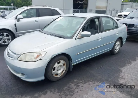 2004 Honda Civic Hybrid from USA, damaged, VIN JHMES95694S006499